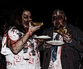 Zombies eating pizza at the Fort Collins Zombie Crawl