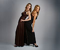 models Tanya Clathis and Stacy DeHart posing in evening wear